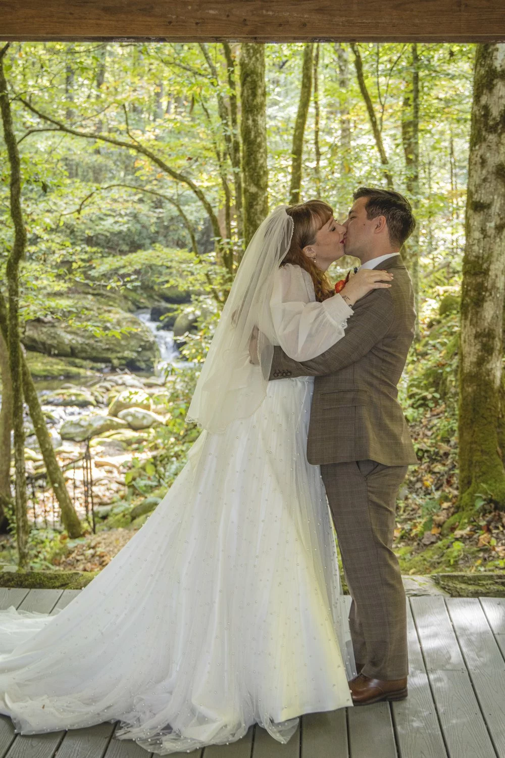 bride and groom kissing