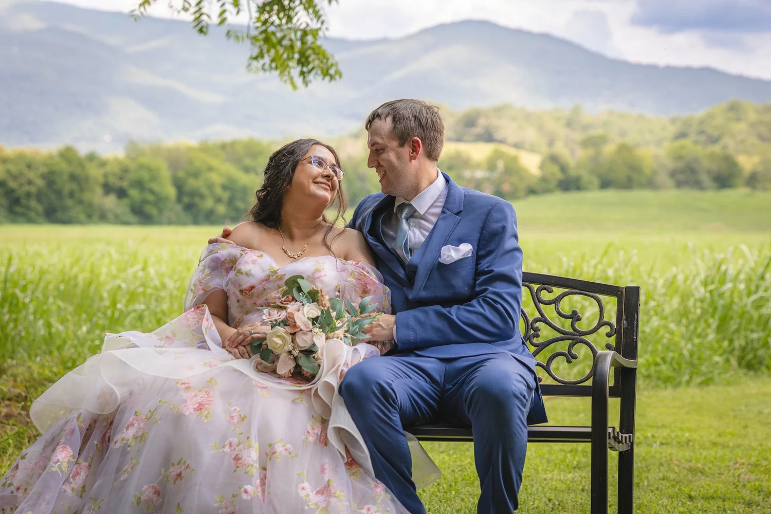 bride and groom with mountain views