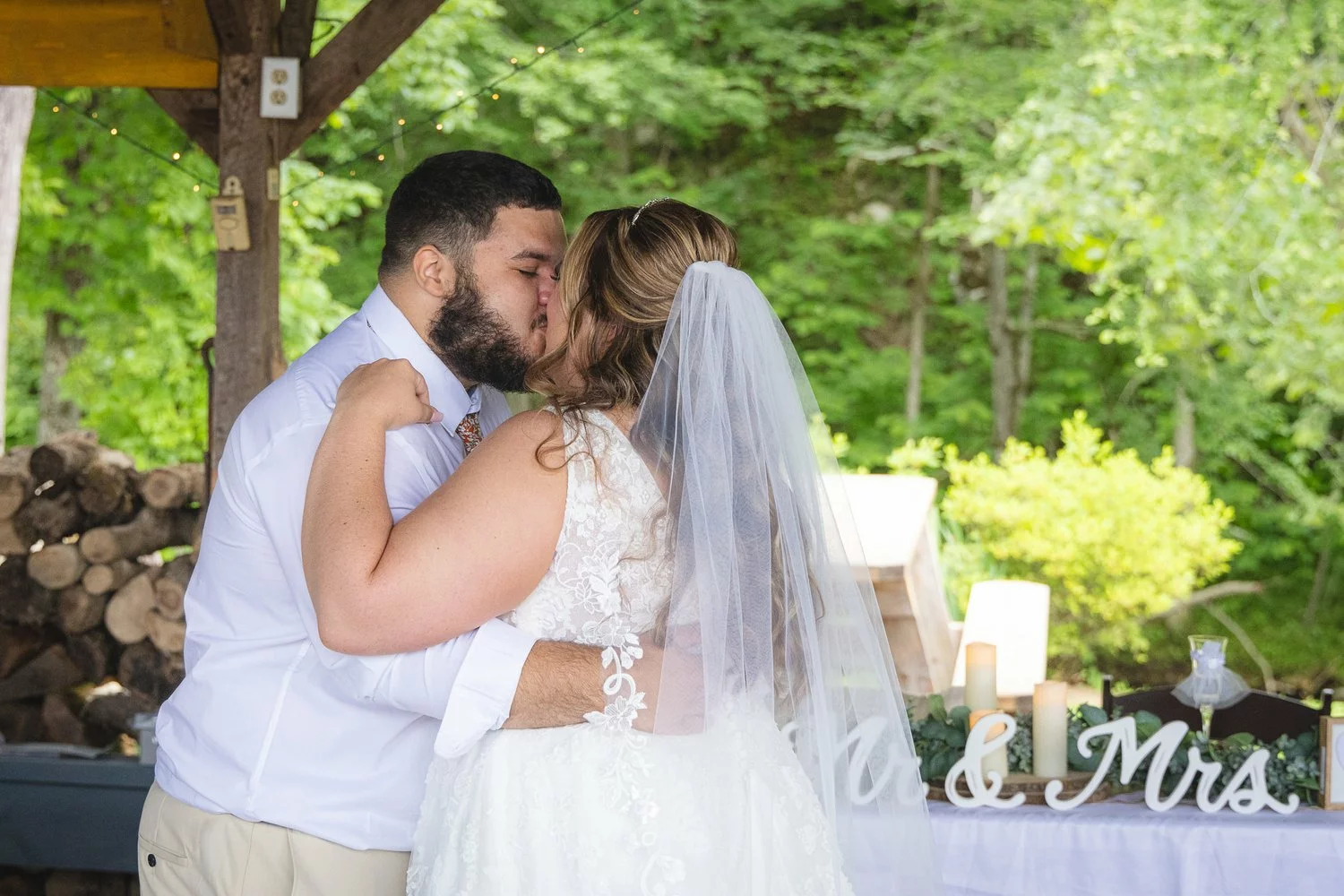 bride and groom kissing