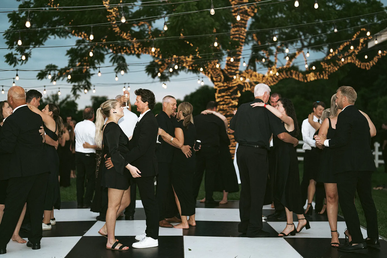 people dancing at wedding reception